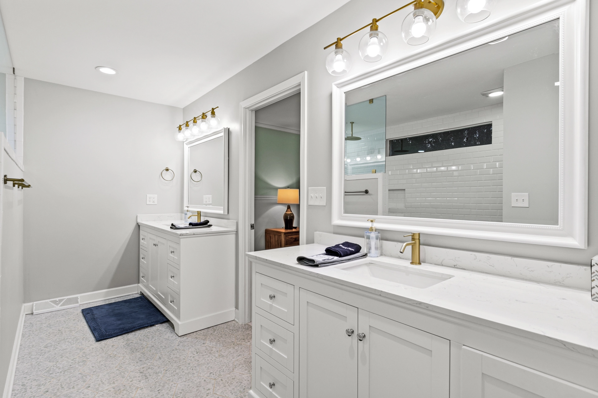 Comfortable, well-appointed short-term rental home illustrating GLOW’s approach to reliable, five-star guest hospitality with double vanity bathroom.