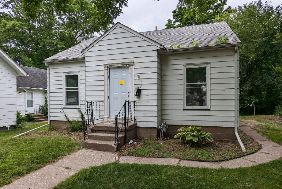 GLOW's Iowa investment property before-and-after renovation demonstrating how targeted improvements increased functionality and rental appeal.