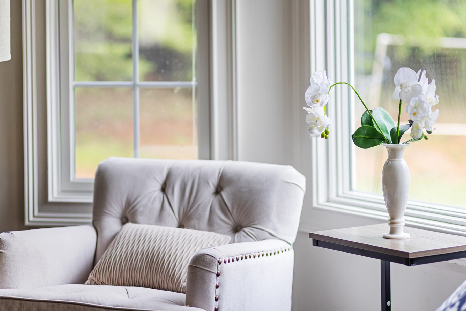 GLOW | owner-focused property management room with a chair